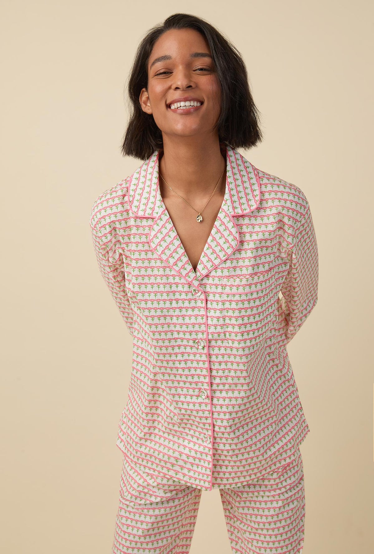 A lady wearing long sleeve classic woven cotton poplin pj set with princess tulips print