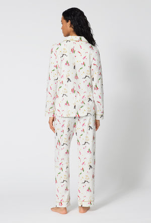 A Lady Wearing Bar A Vin Long Sleeve Classic Stretch Jersey Pj Set facing back while looking to the side