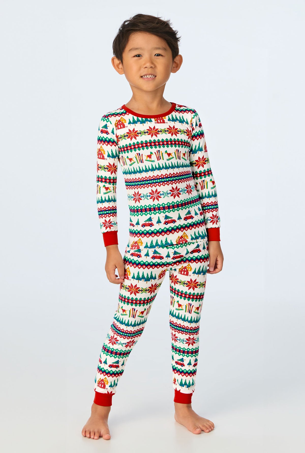 A child wearing Festive Fairisle Long Sleeve Stretch Jersey Kids PJ Set