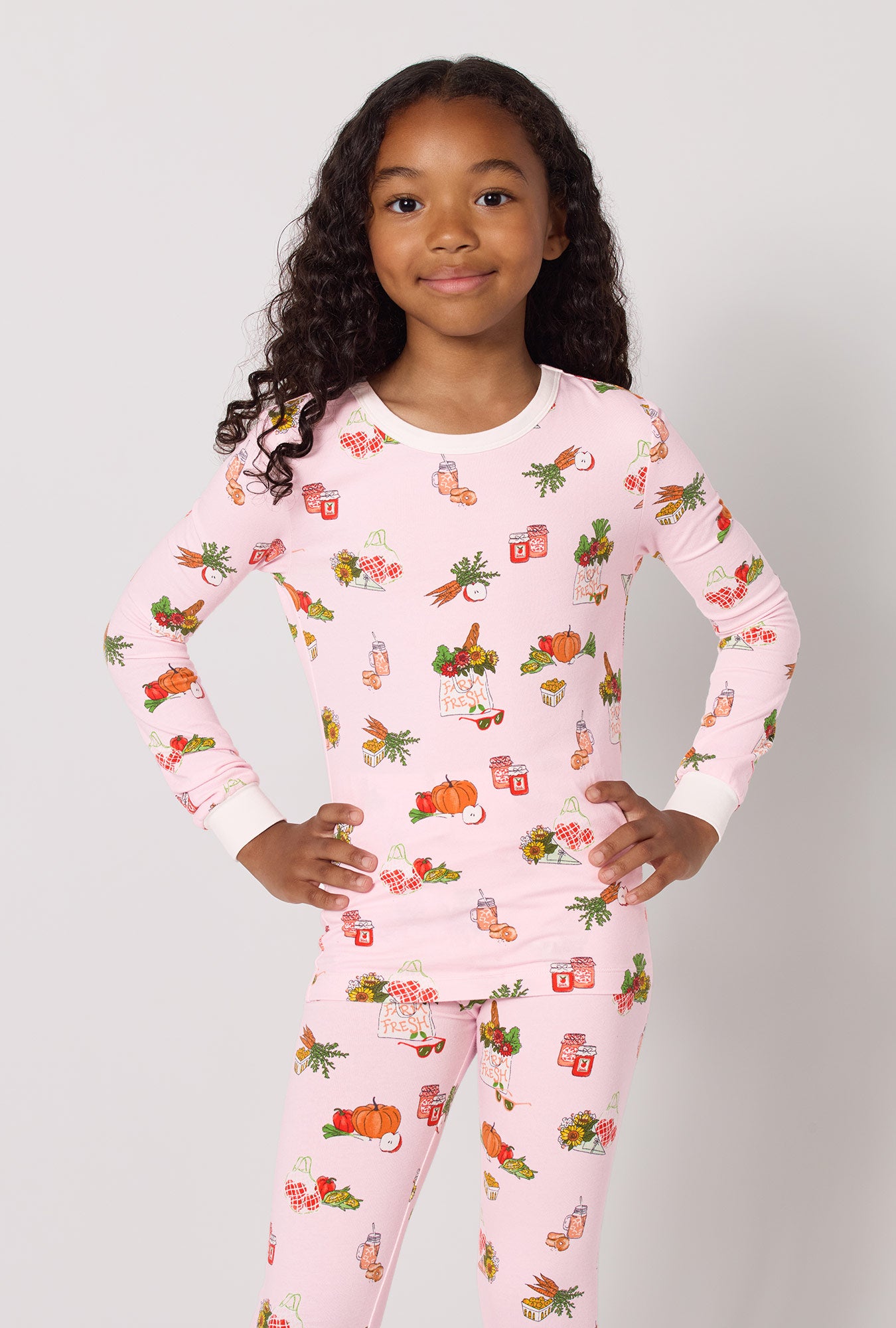 A girl wearing Farm Fresh Long Sleeve Stretch Jersey Kids Pj Set closer look