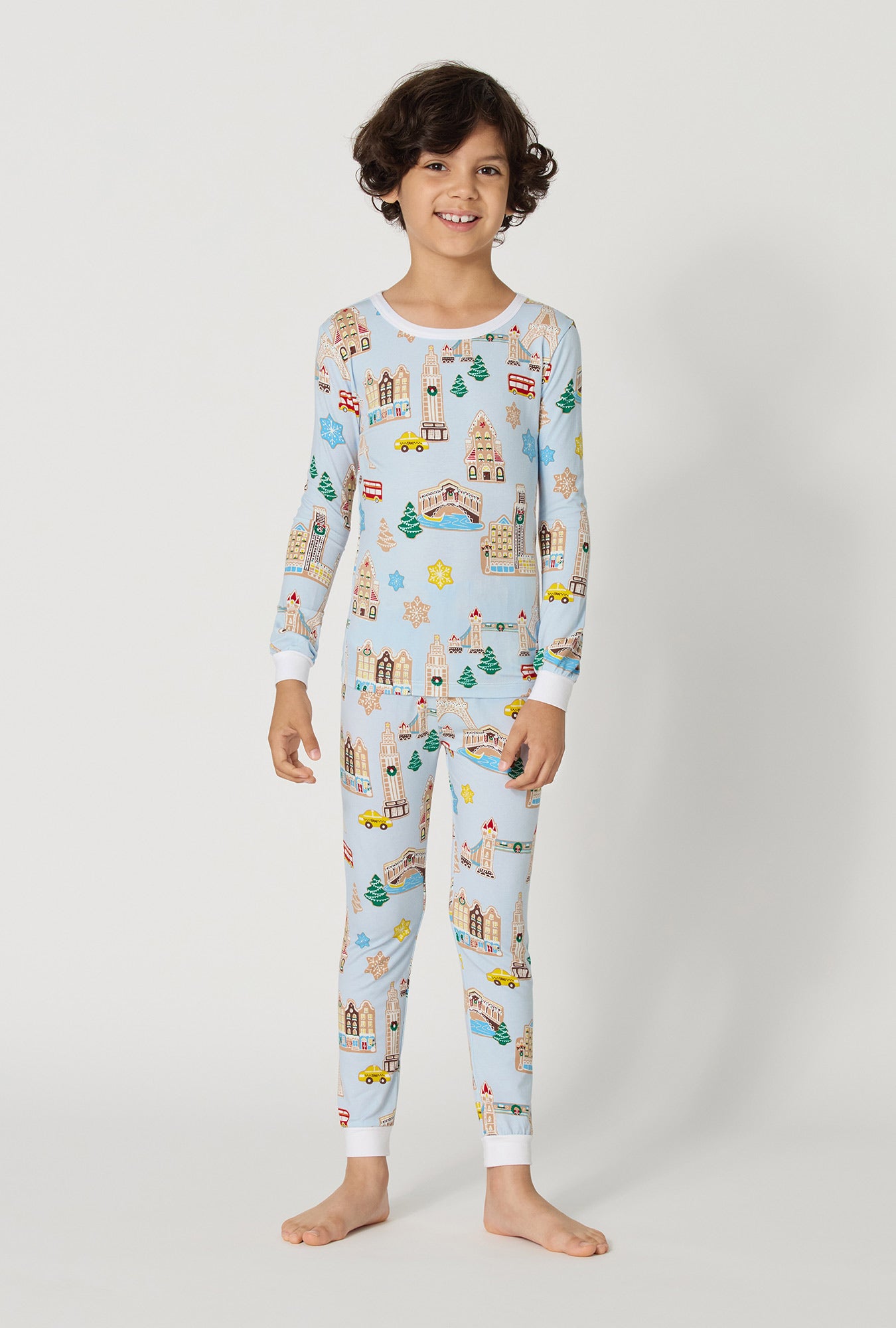 A Boy wearing Gingerbread City Long Sleeve Stretch Jersey Kids Pj Set