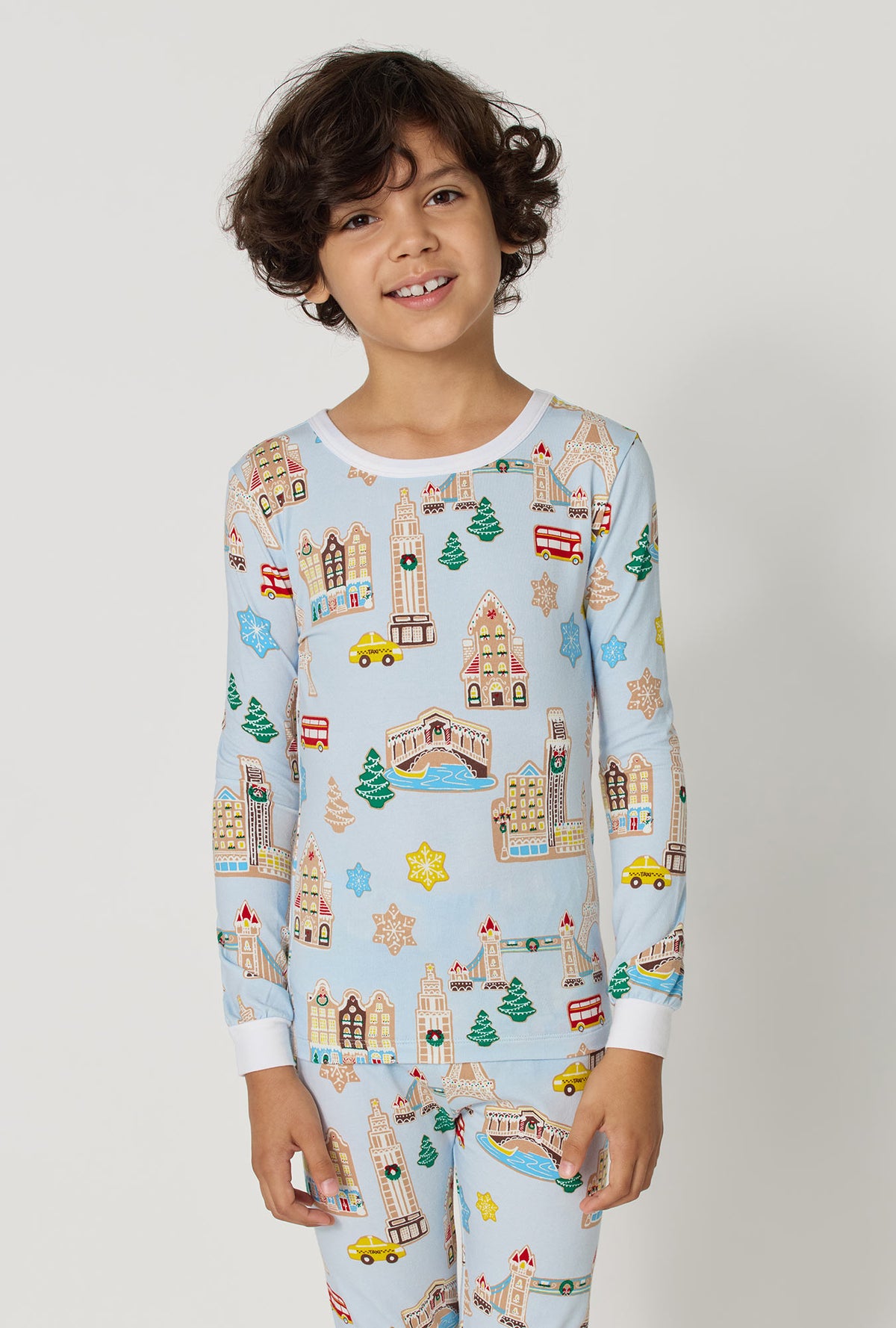 A Boy wearing Gingerbread City Long Sleeve Stretch Jersey Kids Pj Set closer look