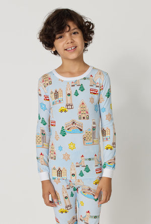 A Boy wearing Gingerbread City Long Sleeve Stretch Jersey Kids Pj Set closer look