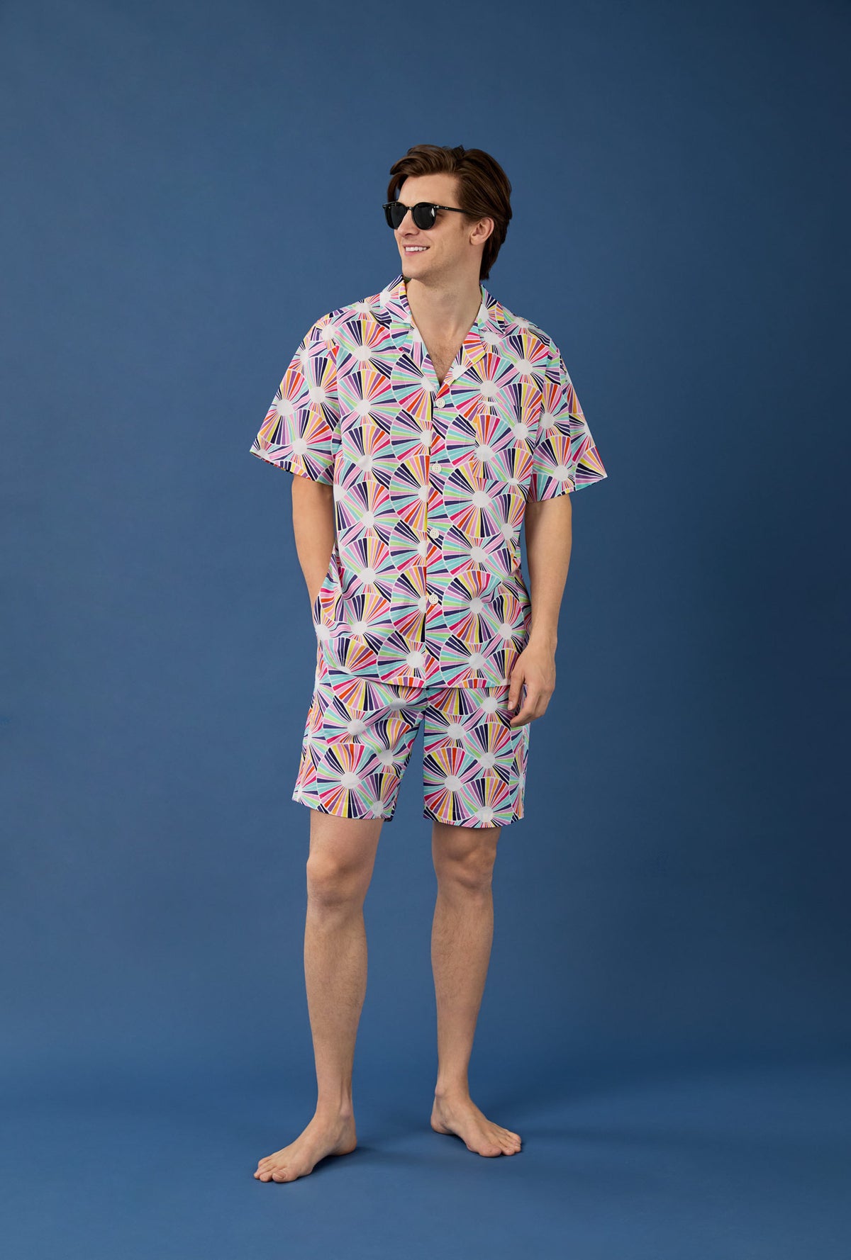 A man wearing  Fanfare Men&#39;s Short Sleeve Notch Woven Cotton Poplin Boxer PJ Set