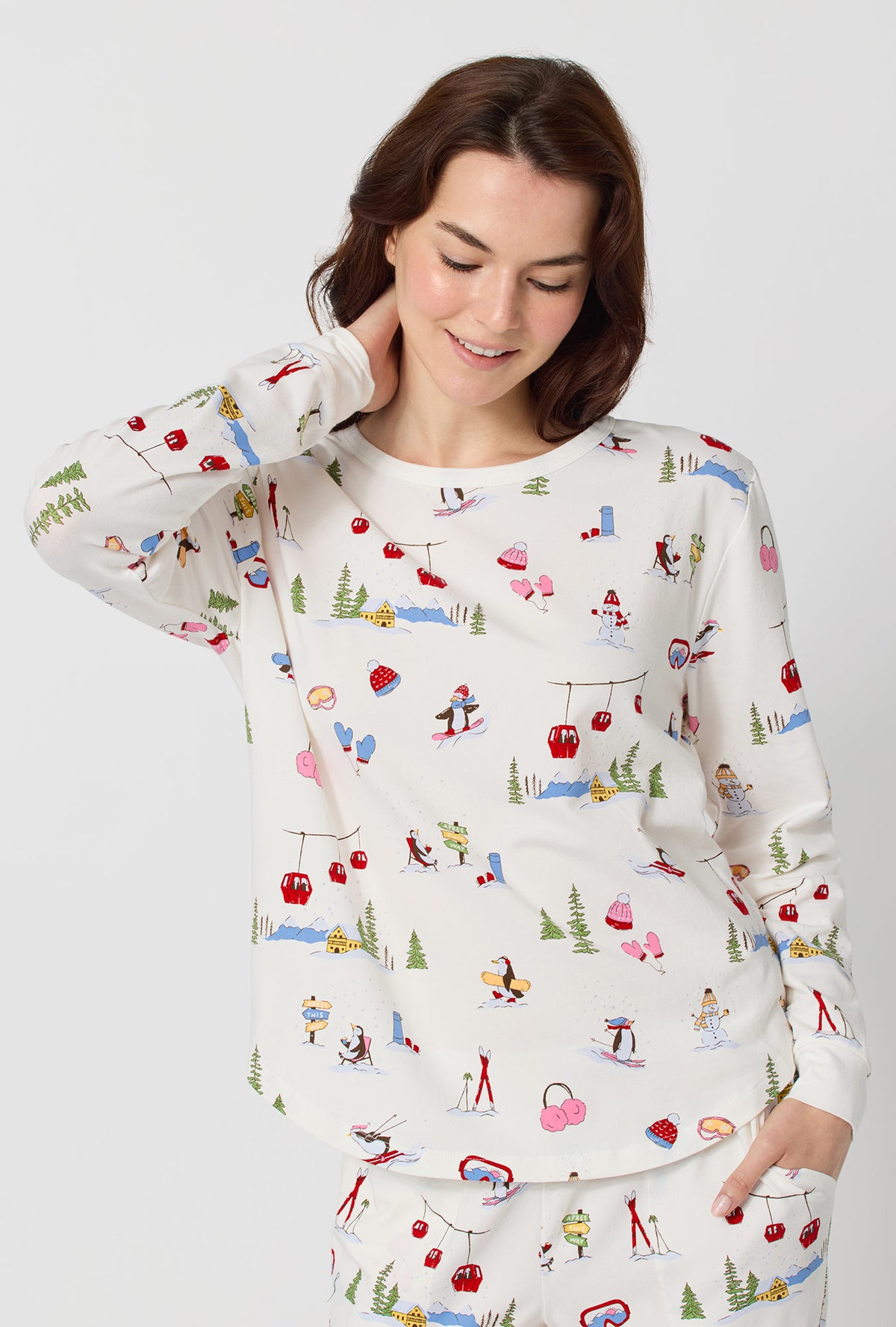 A lady wearing Snow Much Fun Long Sleeve Pullover Crew And Jogger Stretch Jersey Pj Set closer look