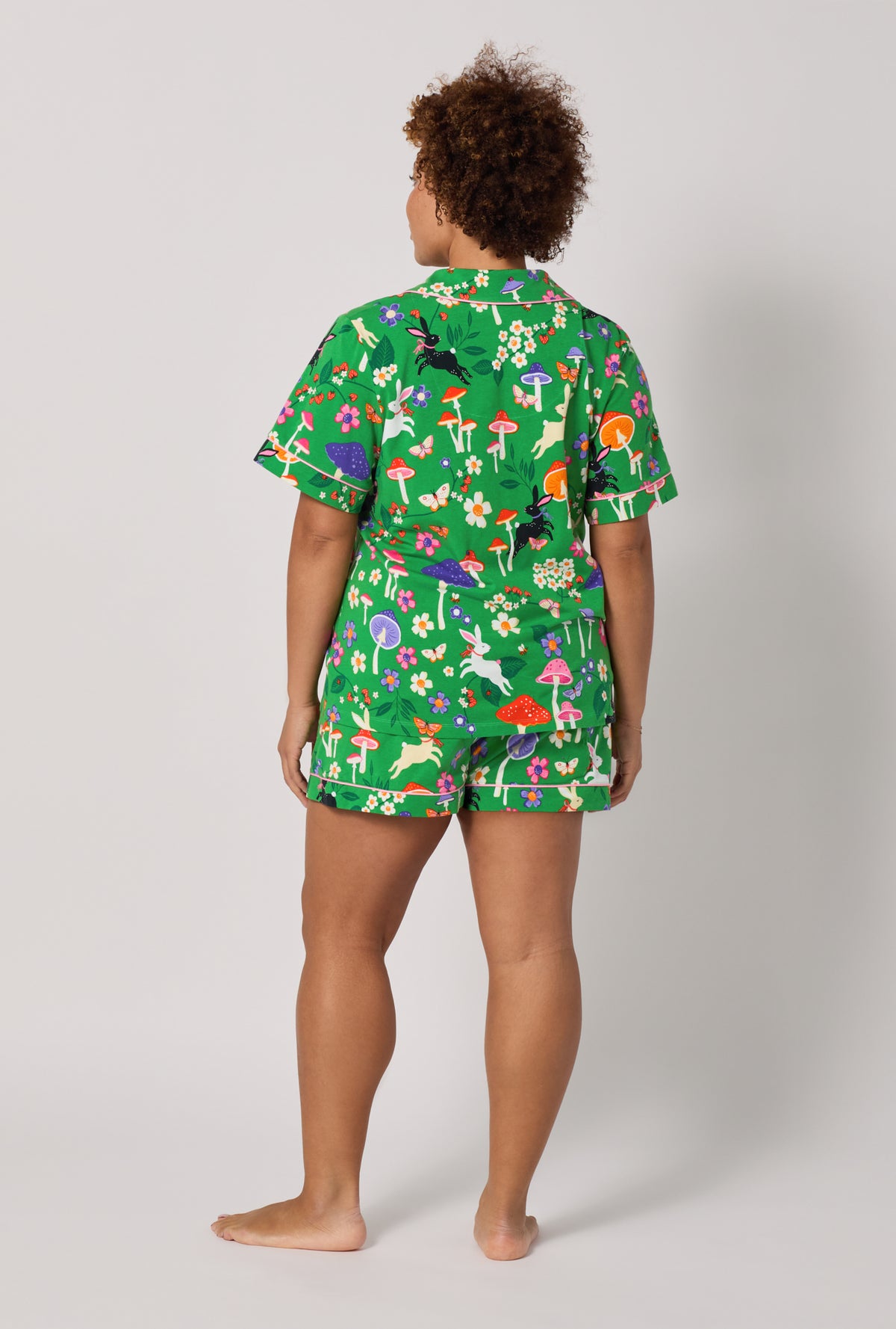 A lady wearing plus Spring Hares Short Sleeve Classic Shorty Stretch Jersey Pj Set