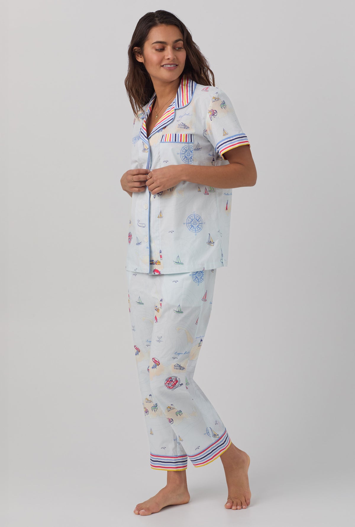 A lady wearing white short sleeve Classic Woven Cotton Poplin Cropped PJ Set with Eastern Seaboard print.