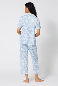A Lady Wearing Minuet Toile Short Sleeve Classic Stretch Jersey Cropped Pj Set posing in a full back view pose