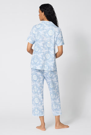 A Lady Wearing Minuet Toile Short Sleeve Classic Stretch Jersey Cropped Pj Set posing in a full back view pose
