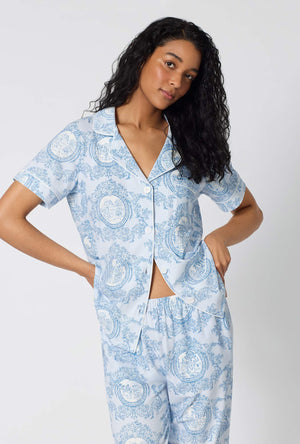 A Lady Wearing Minuet Toile Short Sleeve Classic Stretch Jersey Cropped Pj Set facing front in a closeup shot