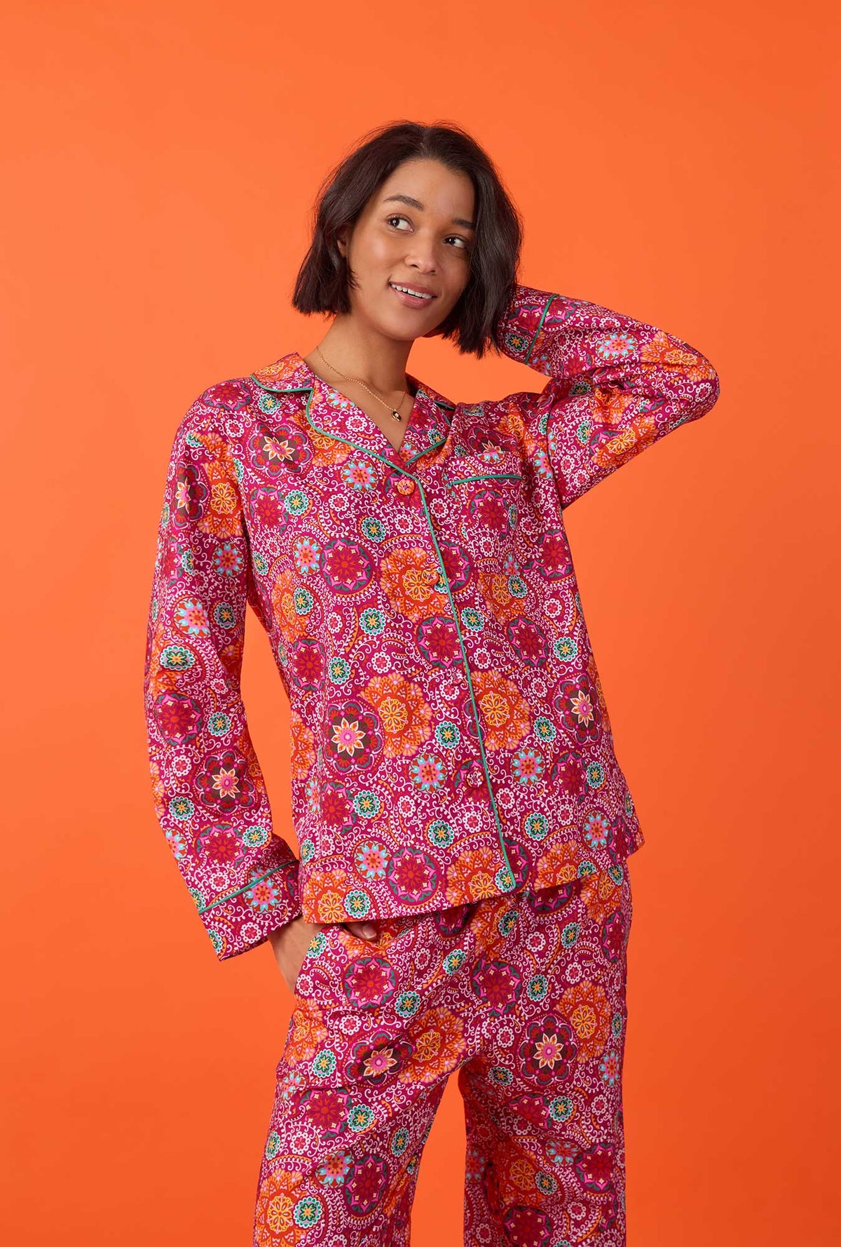 A lady wearing long sleeve classic woven cotton poplin pj set with casablanca print