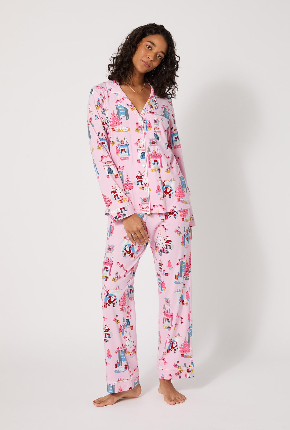 A lady wearing Must Be Santa Long Sleeve Classic Stretch Jersey Pj Set