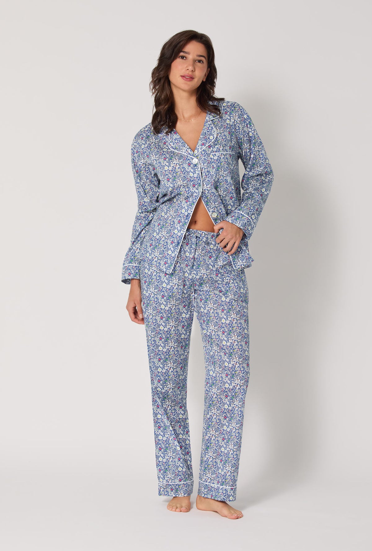 A lady wearing June's Meadow Long Sleeve Classic Woven Tana Lawn® Pj Set Made With Liberty Fabric
