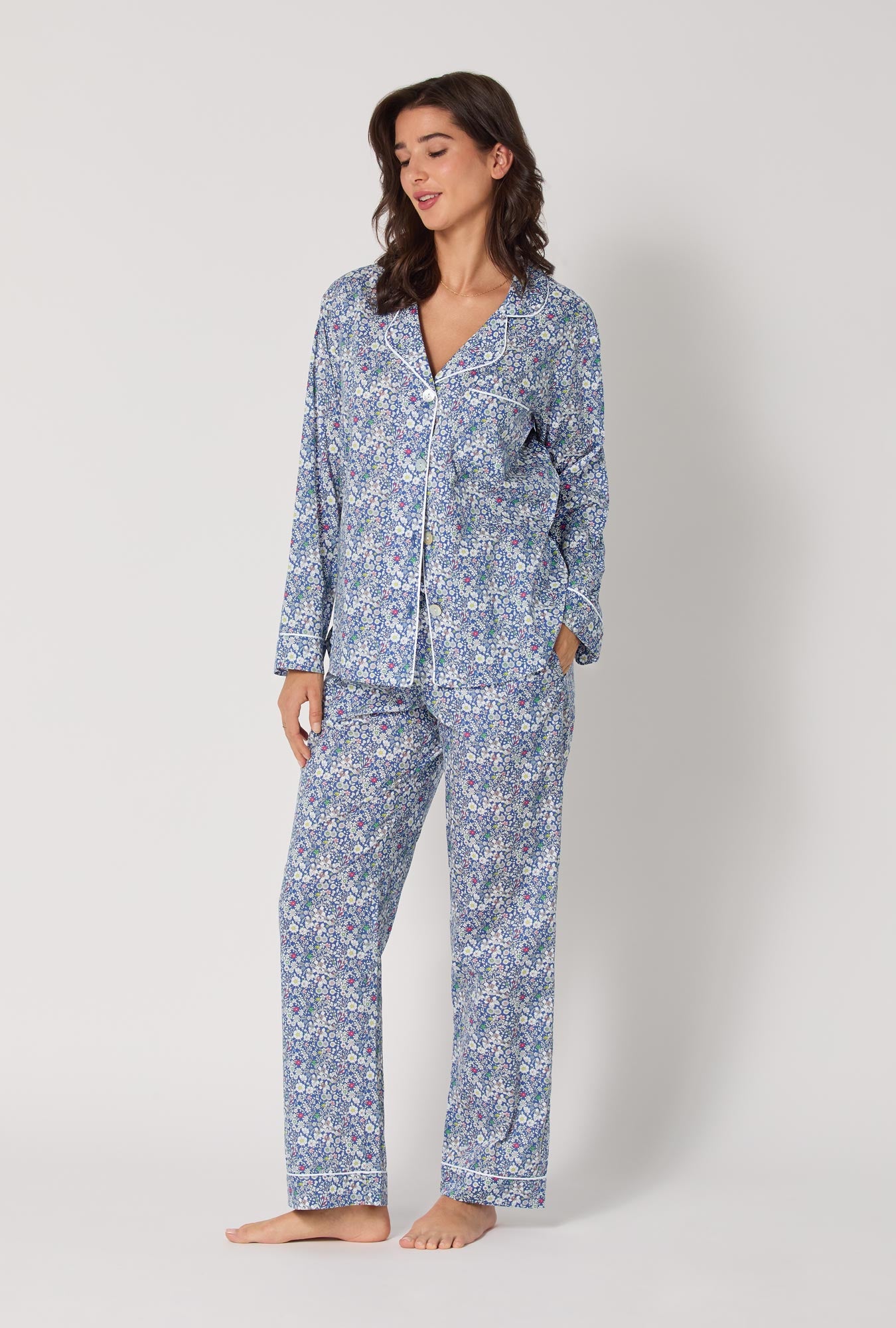 A lady wearing June's Meadow Long Sleeve Classic Woven Tana Lawn® Pj Set Made With Liberty Fabric