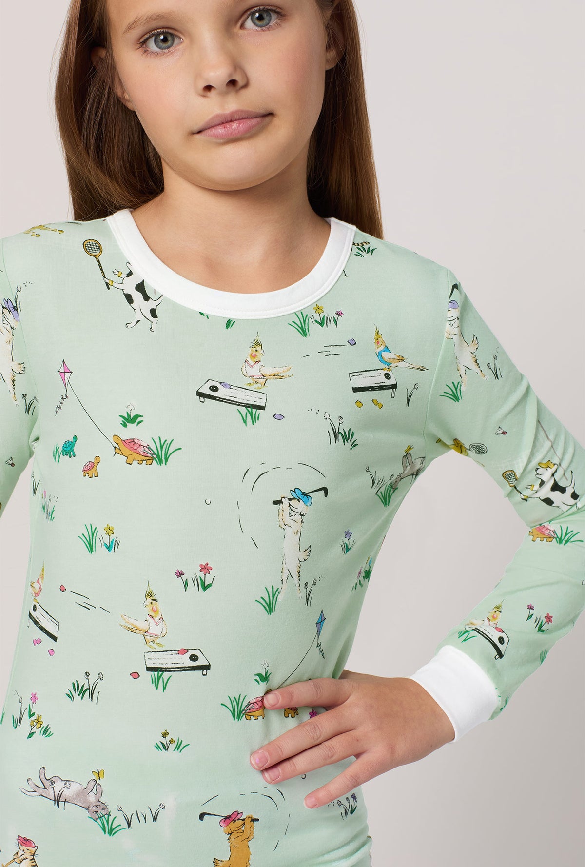 A girl wearing Lawn Games Long Sleeve Stretch Jersey Kids Pj Set