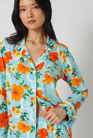 A lady wearing Golden Breeze Long Sleeve Classic Stretch Jersey Pj Set closer look