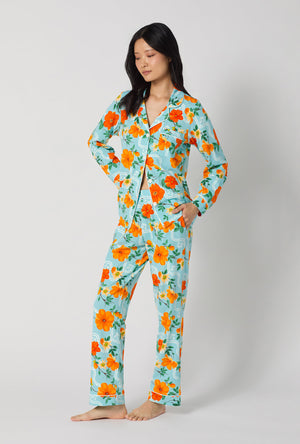 A lady wearing Golden Breeze Long Sleeve Classic Stretch Jersey Pj Set looking front