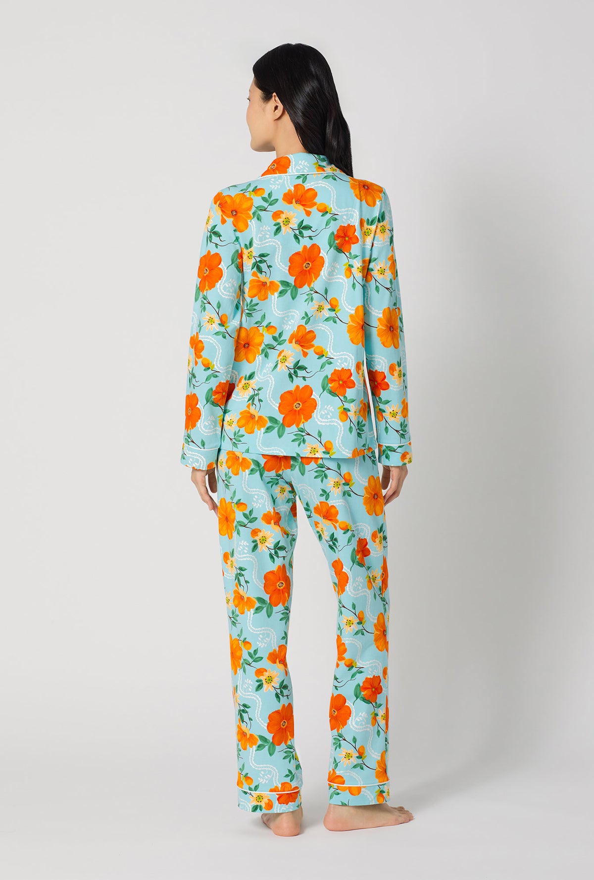 A lady wearing Golden Breeze Long Sleeve Classic Stretch Jersey Pj Set back view