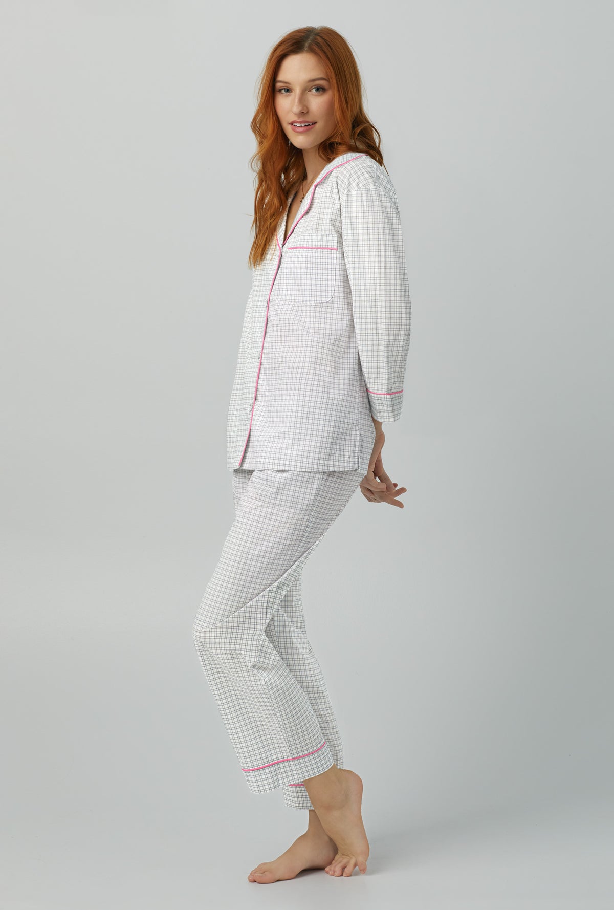 A lady wearing 3/4 Sleeve Classic Woven Cotton Poplin Cropped PJ Set with cottage plaid prints