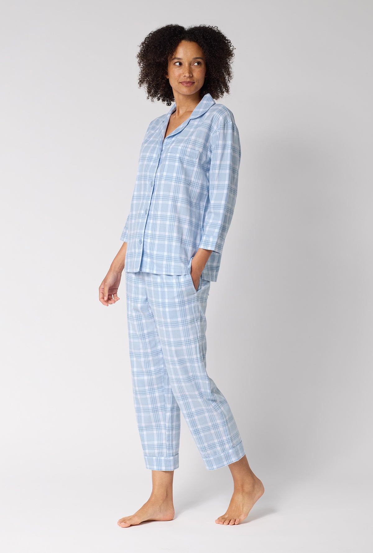 A lady wearing Meadow Haze Plaid 3/4 Sleeve Classic Woven Portuguese Flannel Cropped Pj Set looking side