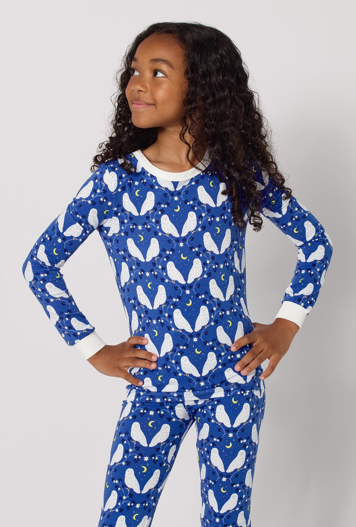 A Girl wearing Owl Be Back Long Sleeve Stretch Jersey Kids Pj Set closer look