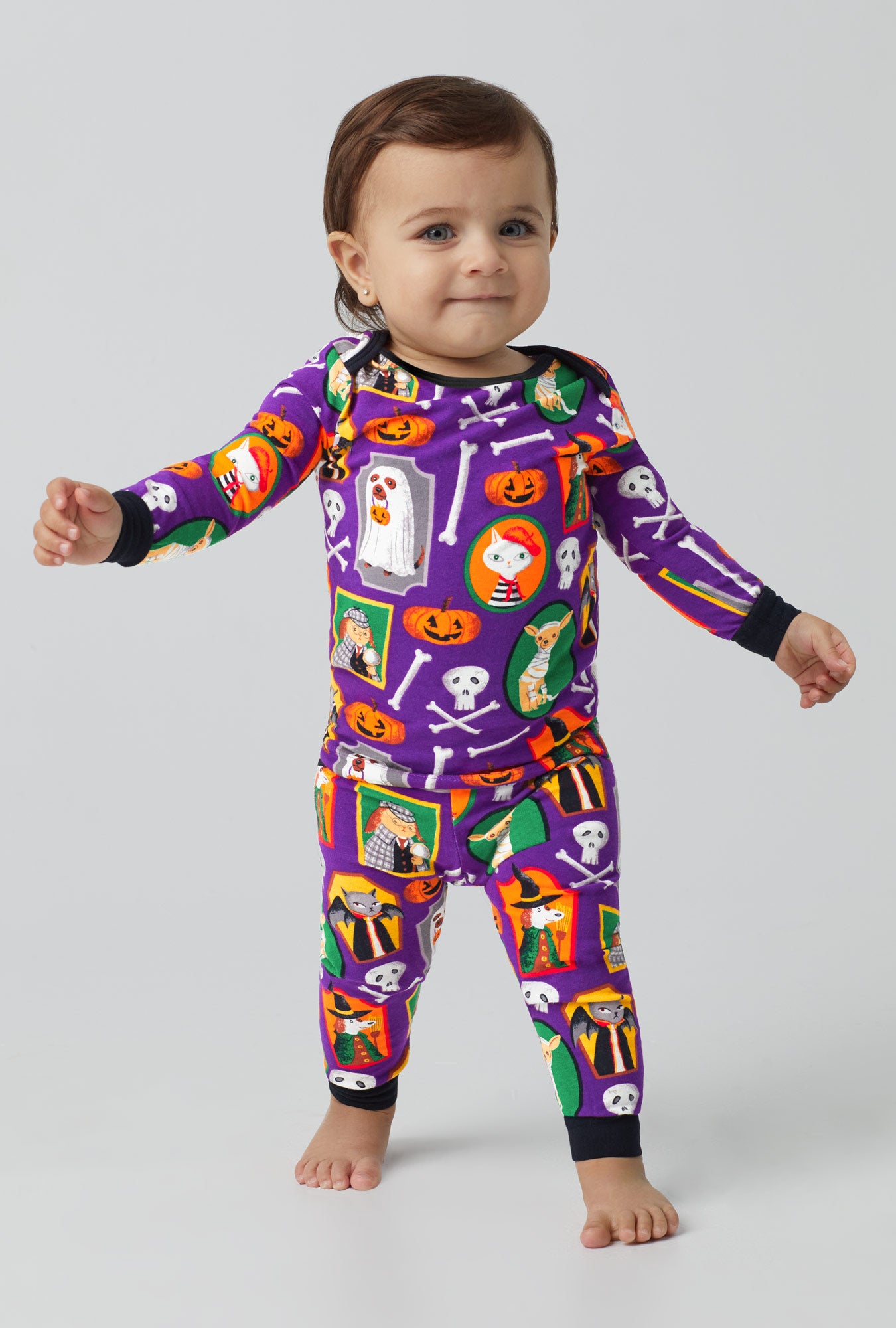 A baby wearing Long Sleeve Classic Stretch Jersey PJ Set with Trick or treat print