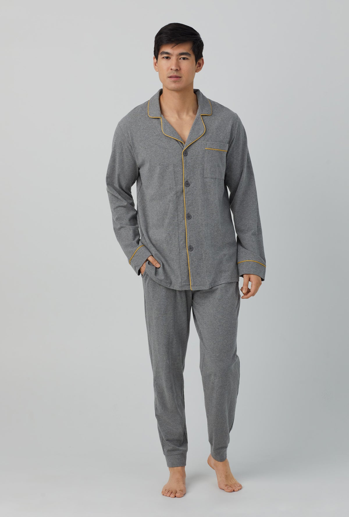 A men wearing grey  Long Sleeve and Jogger Stretch Jersey PJ Set with Charcoal Heather print
