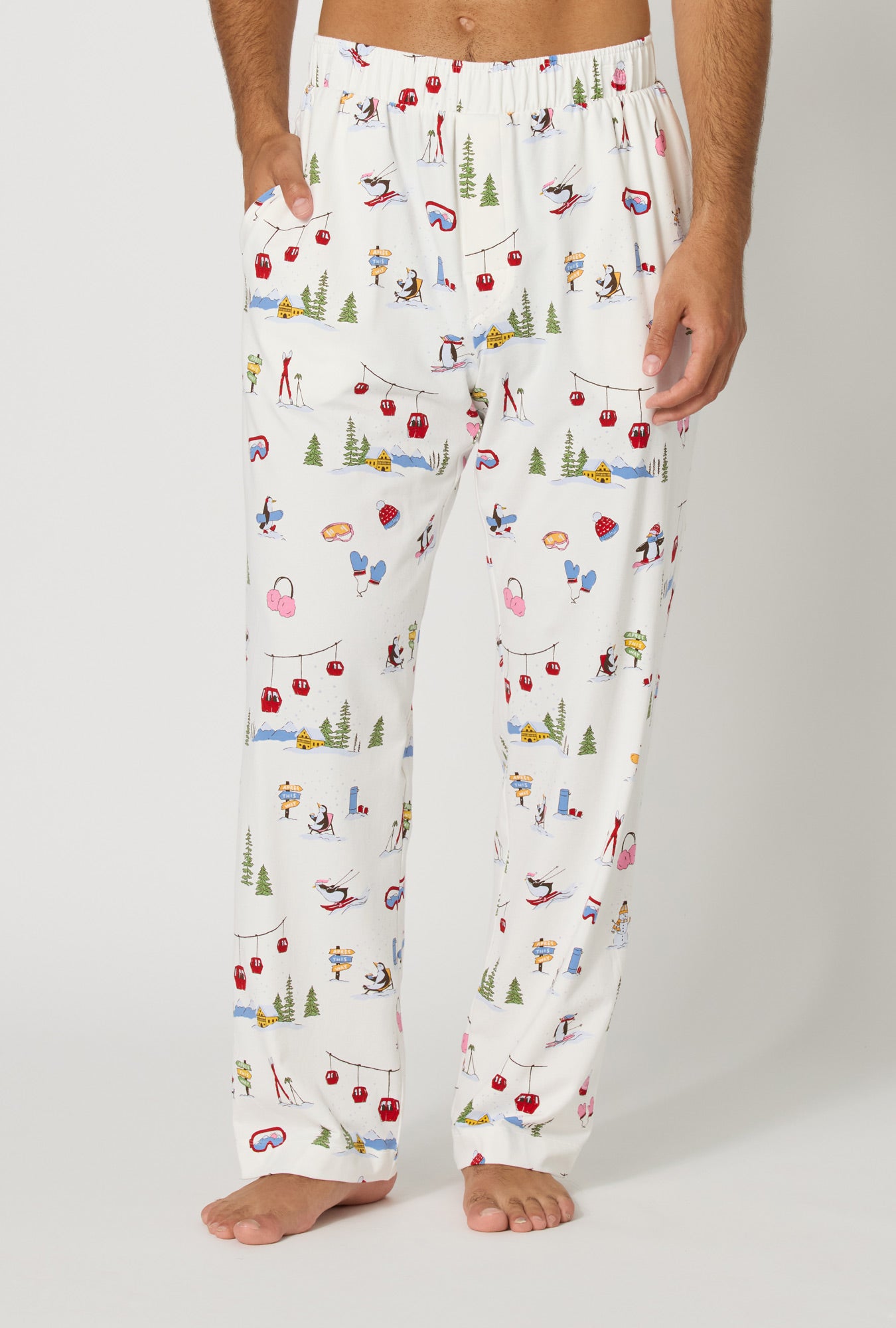 A man wearing Snow Much Fun Men's Stretch Jersey Pj Pant
