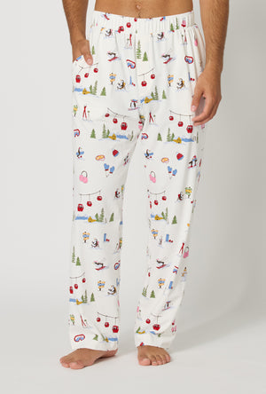 A man wearing Snow Much Fun Men's Stretch Jersey Pj Pant