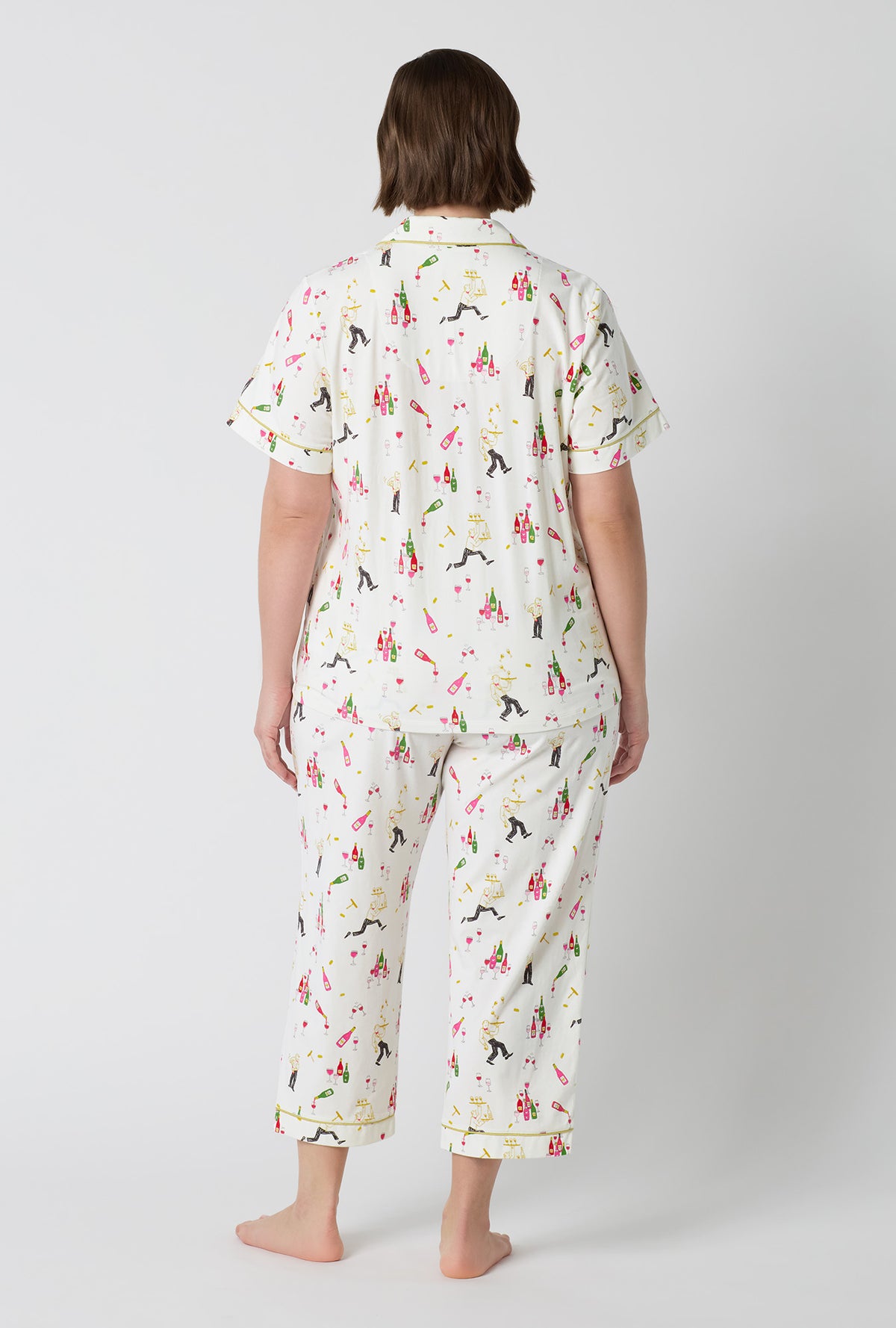 A Lady Wearing Plus Size Bar A Vin Short Sleeve Classic Stretch Jersey Cropped Pj Set in a back facing pose