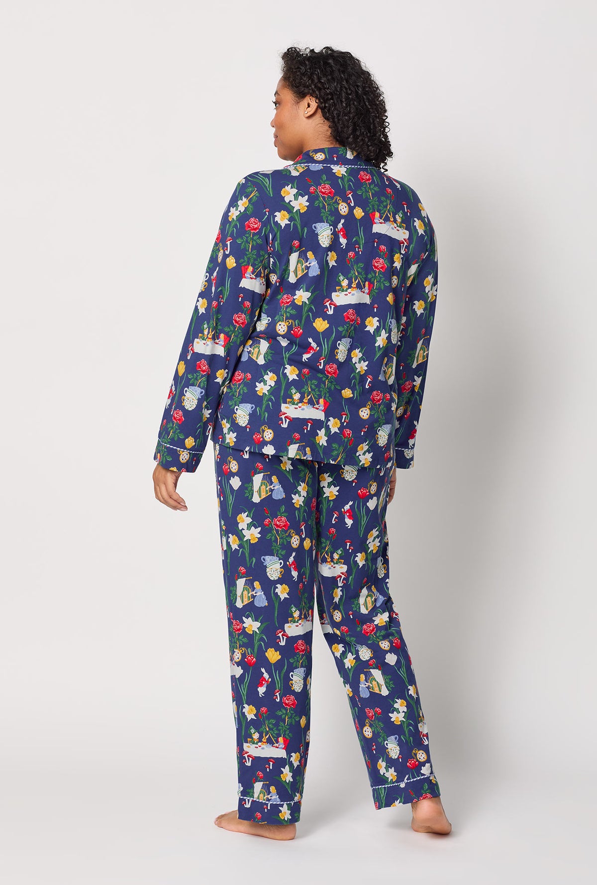 A lady wearing plus size Alice's Adventures Long Sleeve Classic Stretch Jersey Pj Set