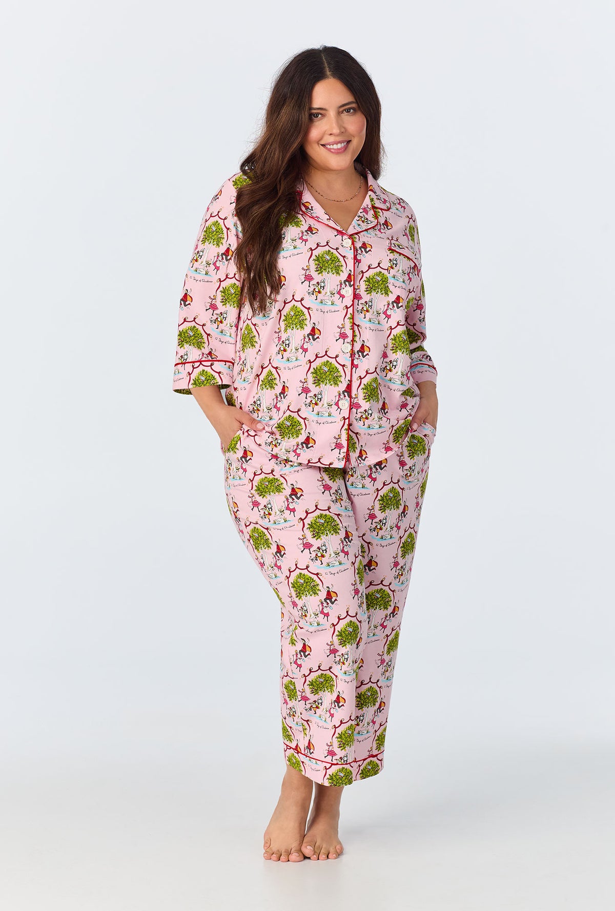 A lady wearing Twelve Days Of Christmas 3/4 Sleeve Classic Stretch Jersey Cropped PJ Set