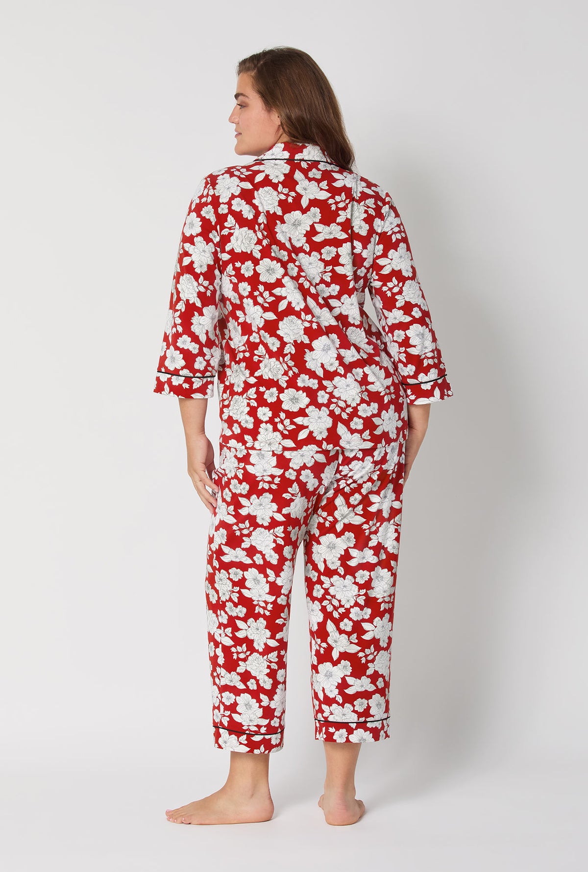 A lady wearing Floral Charm 3/4 Sleeve Classic Stretch Jersey Cropped Pj Set