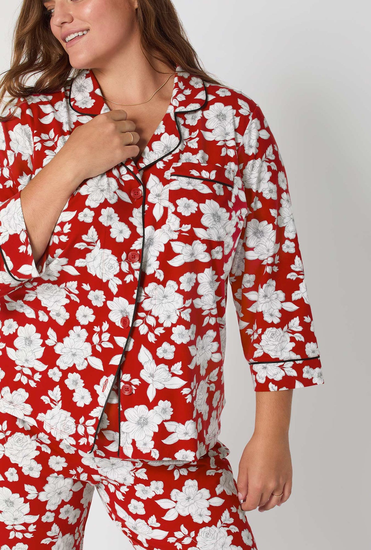 A lady wearing Floral Charm 3/4 Sleeve Classic Stretch Jersey Cropped Pj Set