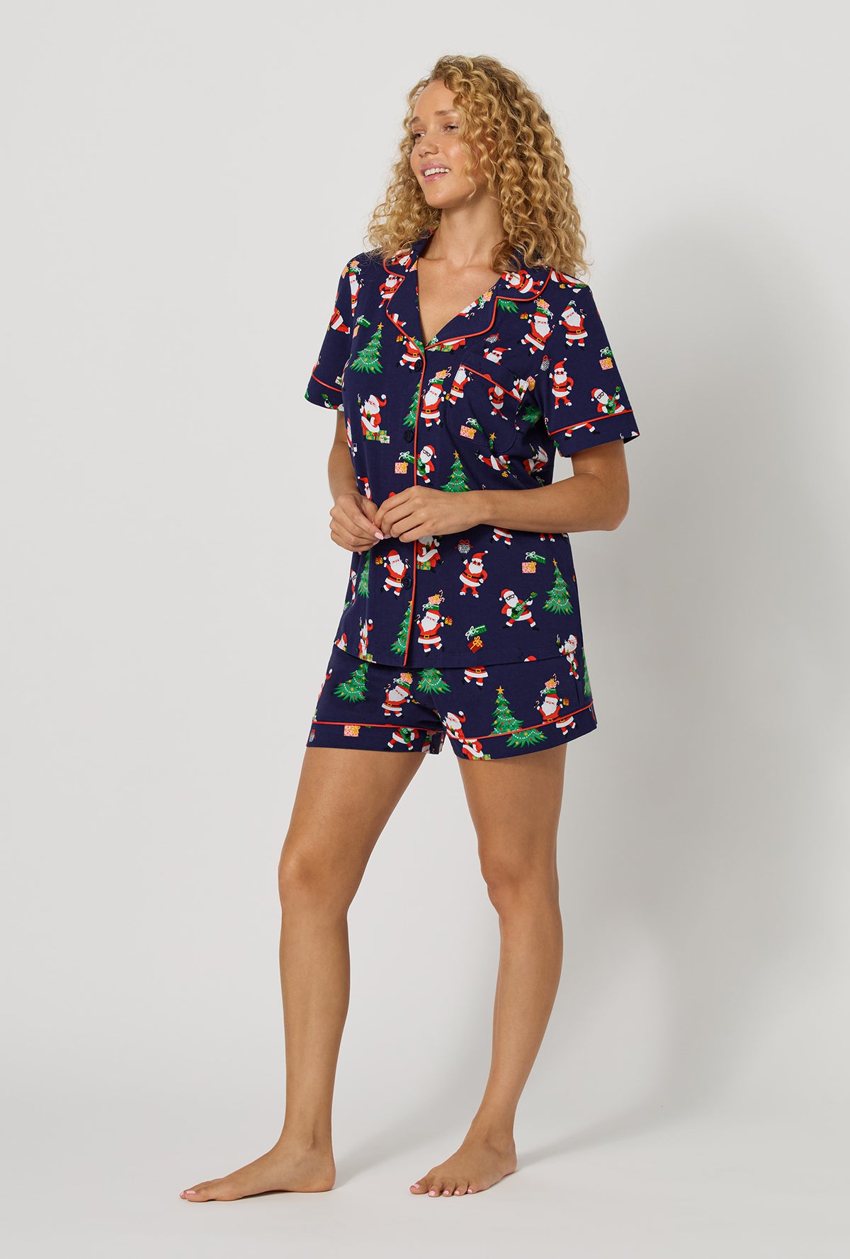 A lady wearing Santa's Night Out Short Sleeve Classic Shorty Stretch Jersey Pj Set