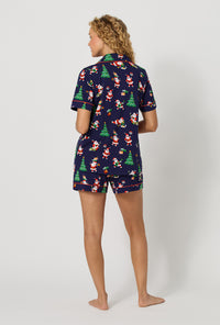 A lady wearing Santa's Night Out Short Sleeve Classic Shorty Stretch Jersey Pj Set back view