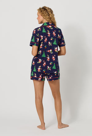 A lady wearing Santa's Night Out Short Sleeve Classic Shorty Stretch Jersey Pj Set back view