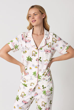 A Lady Wearing Poolside Poodles Short Sleeve Classic Stretch Jersey Cropped PJ Set Closeup View