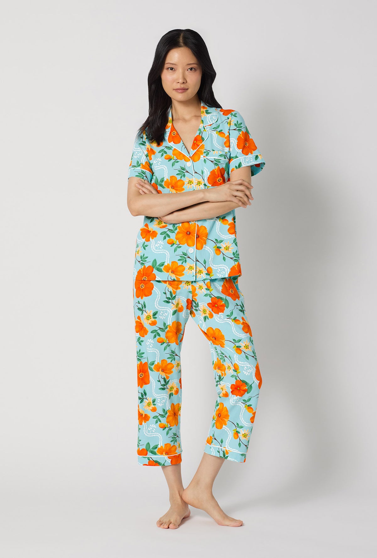 A lady wearing Golden Breeze Short Sleeve Classic Stretch Jersey Cropped Pj Set looking front