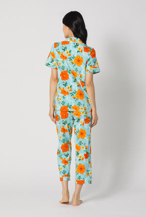 A lady wearing Golden Breeze Short Sleeve Classic Stretch Jersey Cropped Pj Set back view