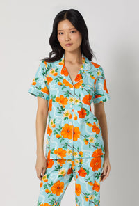 A lady wearing Golden Breeze Short Sleeve Classic Stretch Jersey Cropped Pj Set closer look