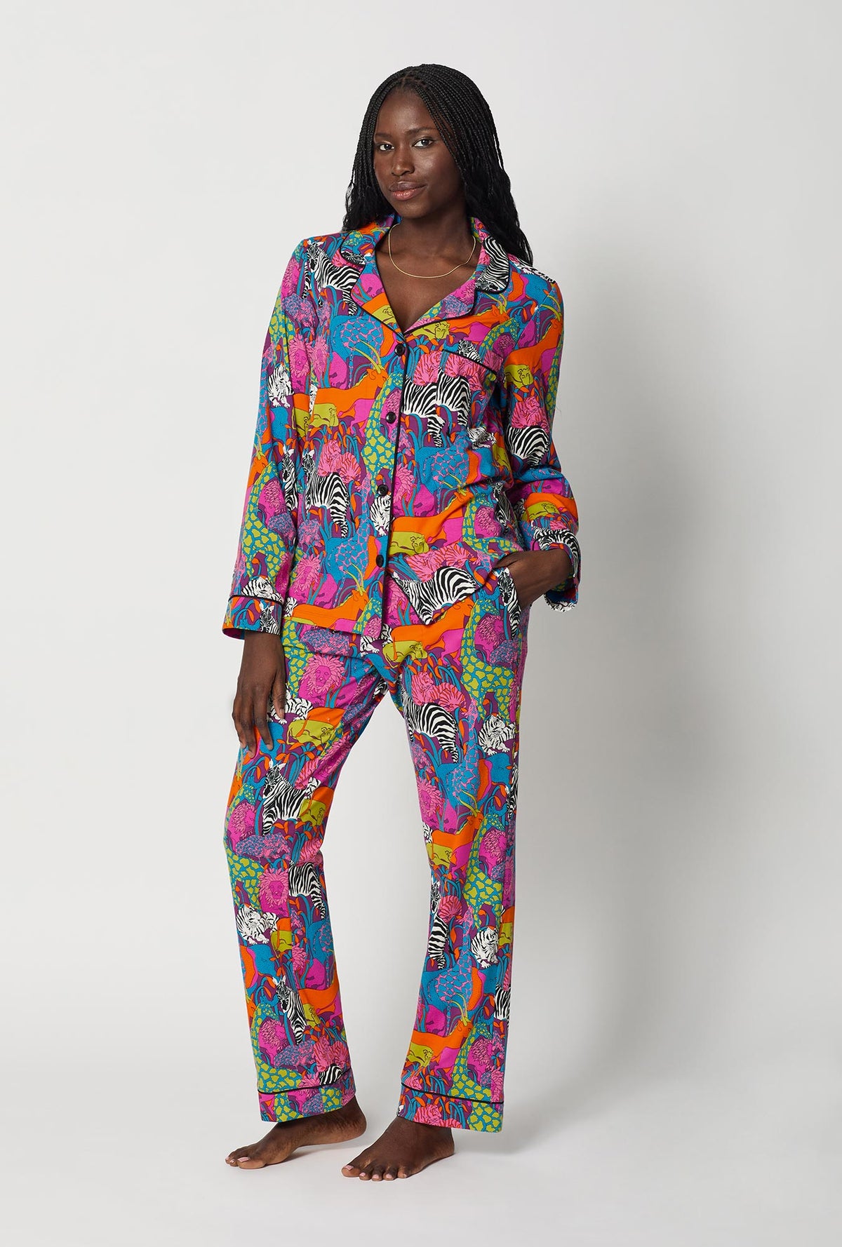 A lady wearing BedHead x Trina Turk Jungle Long Sleeve Classic Stretch Jersey Pj Set
