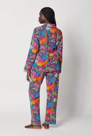 A lady wearing BedHead x Trina Turk Jungle Long Sleeve Classic Stretch Jersey Pj Set