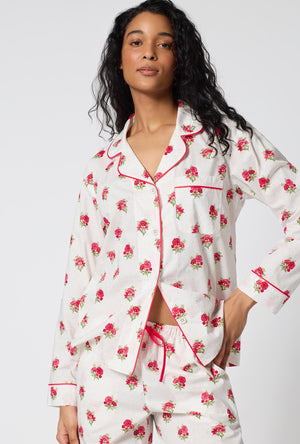 A Lady Wearing Celeste Long Sleeve Classic Woven Supersoft Cotton Poplin Pj Set facing front in a half close up shot