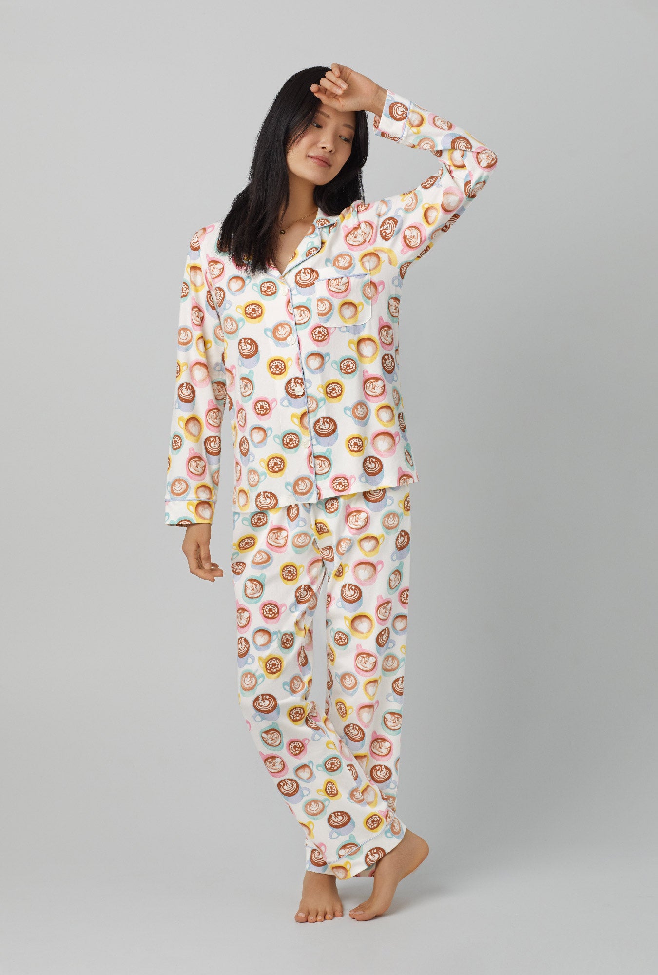 A lady wearing white long Sleeve Classic Stretch Jersey PJ Set with Lots of latte print