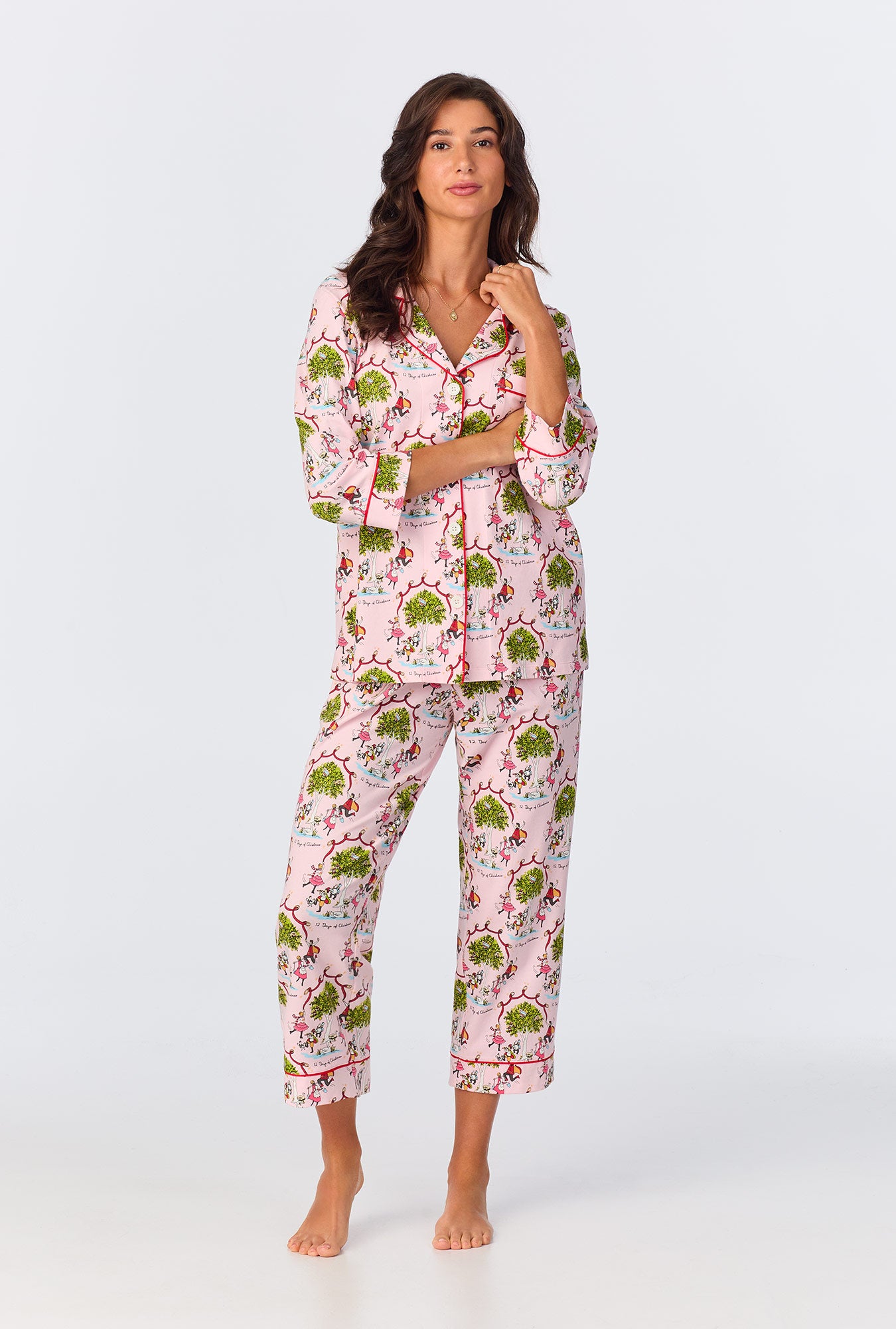 A lady wearing Twelve Days Of Christmas 3/4 Sleeve Classic Stretch Jersey Cropped PJ Set