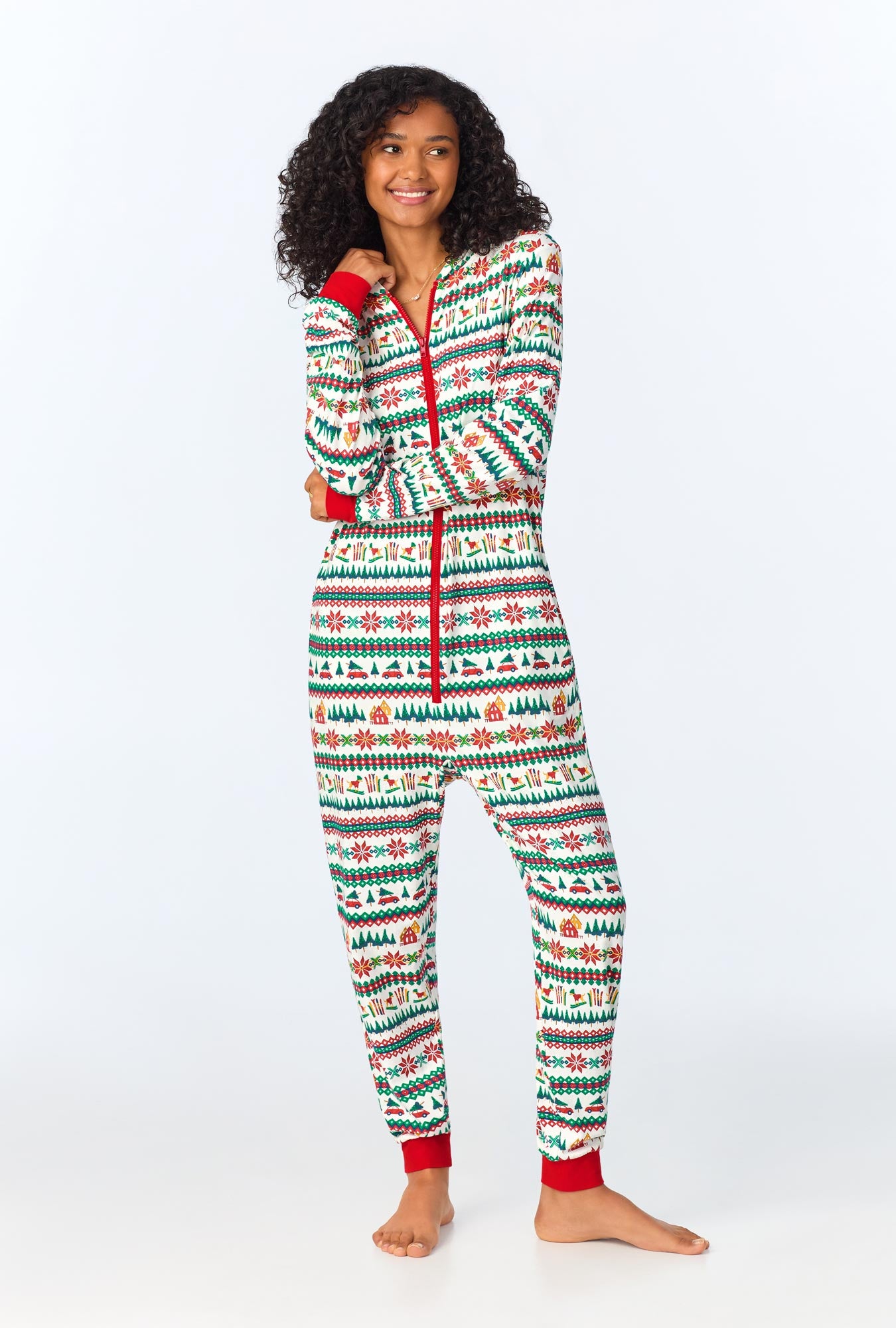 A lady wearing festive fairisle onsie