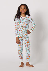 A lady wearing Woodland Wonder Long Sleeve Stretch Jersey Kids Pj Set
