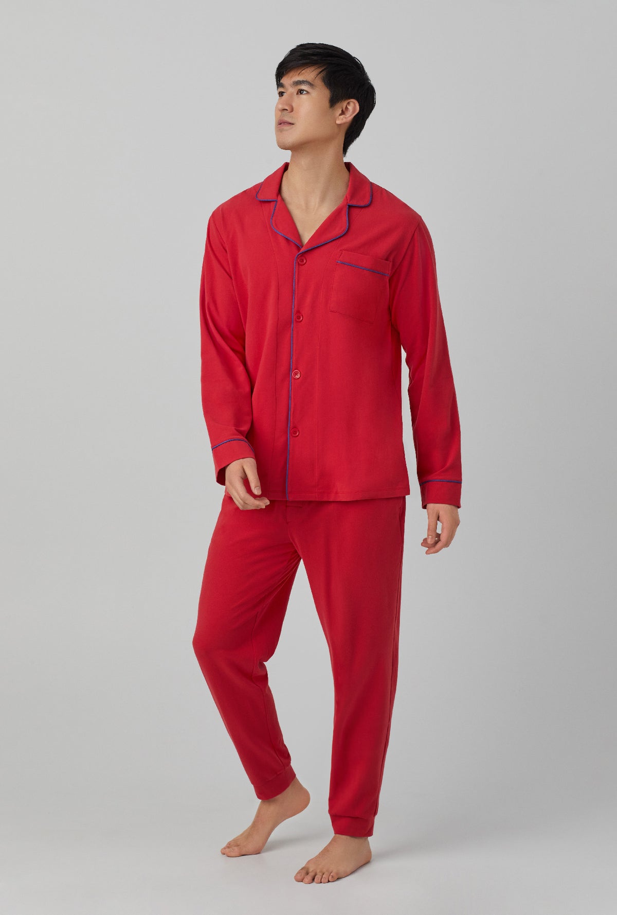 A men wearing red Long Sleeve and Jogger Stretch Jersey PJ Set with Samba Red print