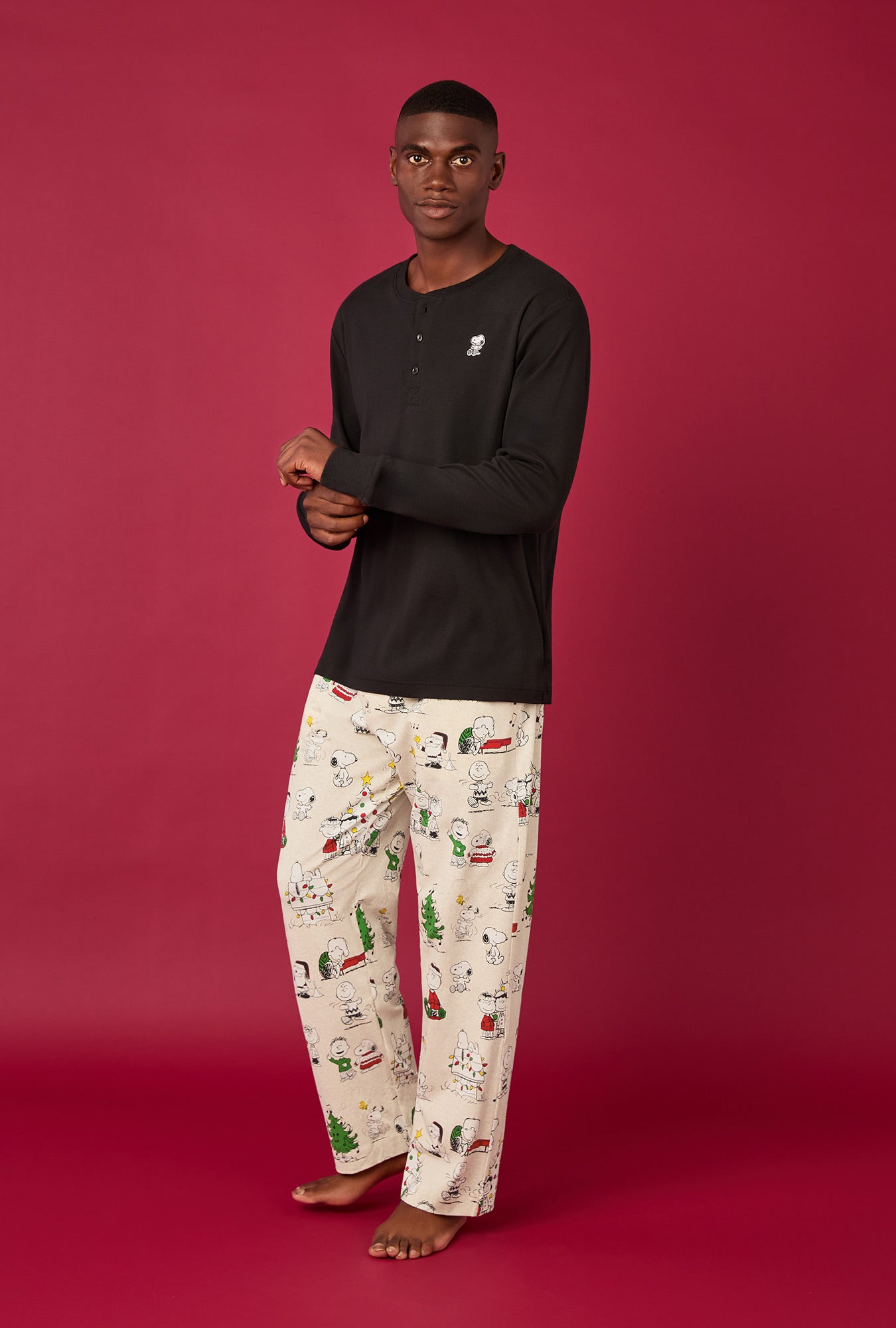 A man wearing Men's Long Sleeve Henley Stretch Jersey Pj Set